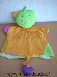 Chat Orange vert violet devant et vert derriere Bledina