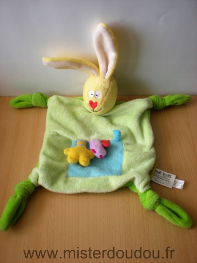 Taf toys Lapin Vert bleu jaune - Très bon état