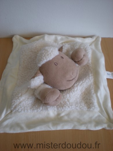 Mouton Ecru blanc et un carre en velour jaune dessous Nature et découvertes