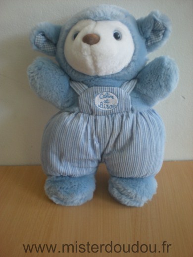 Calin et bisous Ours Salopette bleu en tissus velours et le reste en peluche - Bon état