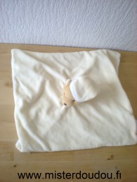 Ours Jaune dessus tissus blanc dessous Noukie s