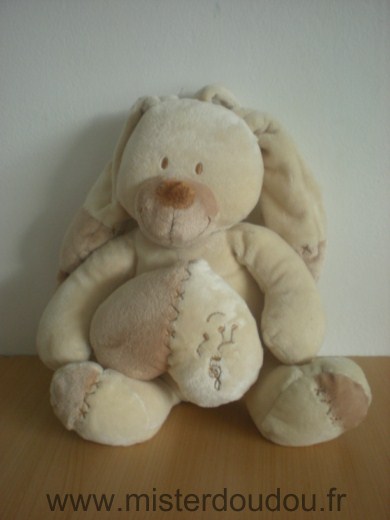 Doudou Lapin Nicotoy Ecru beige avec un coeur sur le ventre pour actionner la boite a musique 