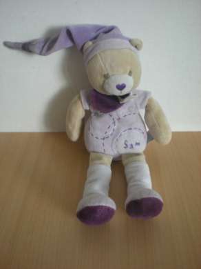 Doudou Ours Doudou et compagnie Sam mauve Bon état général mais bout du bonnet usagé