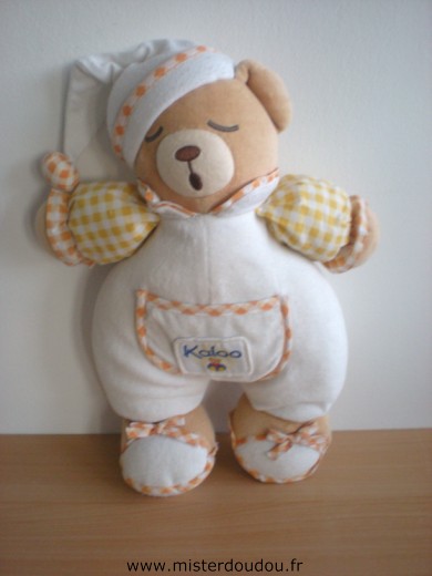 Doudou Ours Kaloo Blanc jaune orange Etat général bon mais des traces ne sont pas parties au lavage et tissus bouloché, petit prix pour dépanner